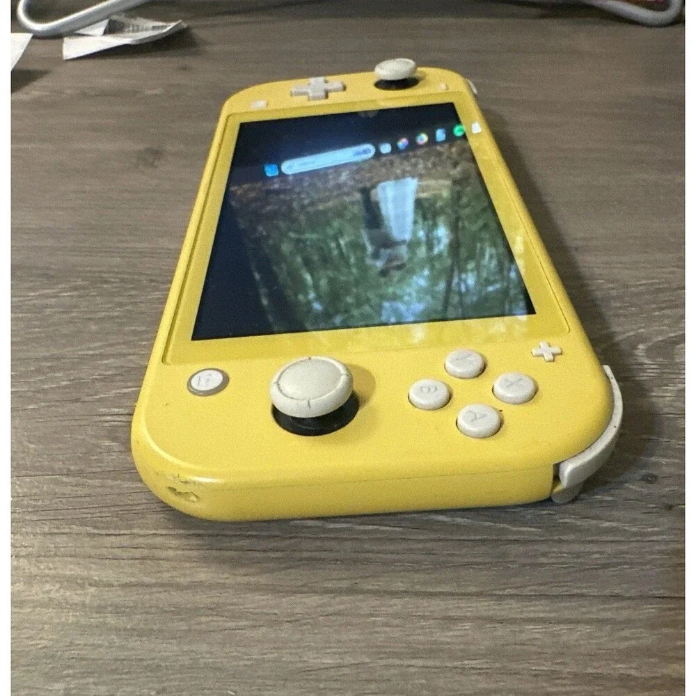 Nintendo Switch Lite Yellow Handheld Console Tested Works w/ microSD Card